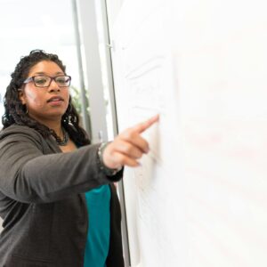 Woman Beside Whiteboard